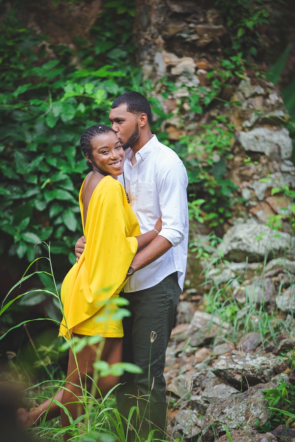 St. Croix bride and groom smiling in rain forrest with historical ruins
