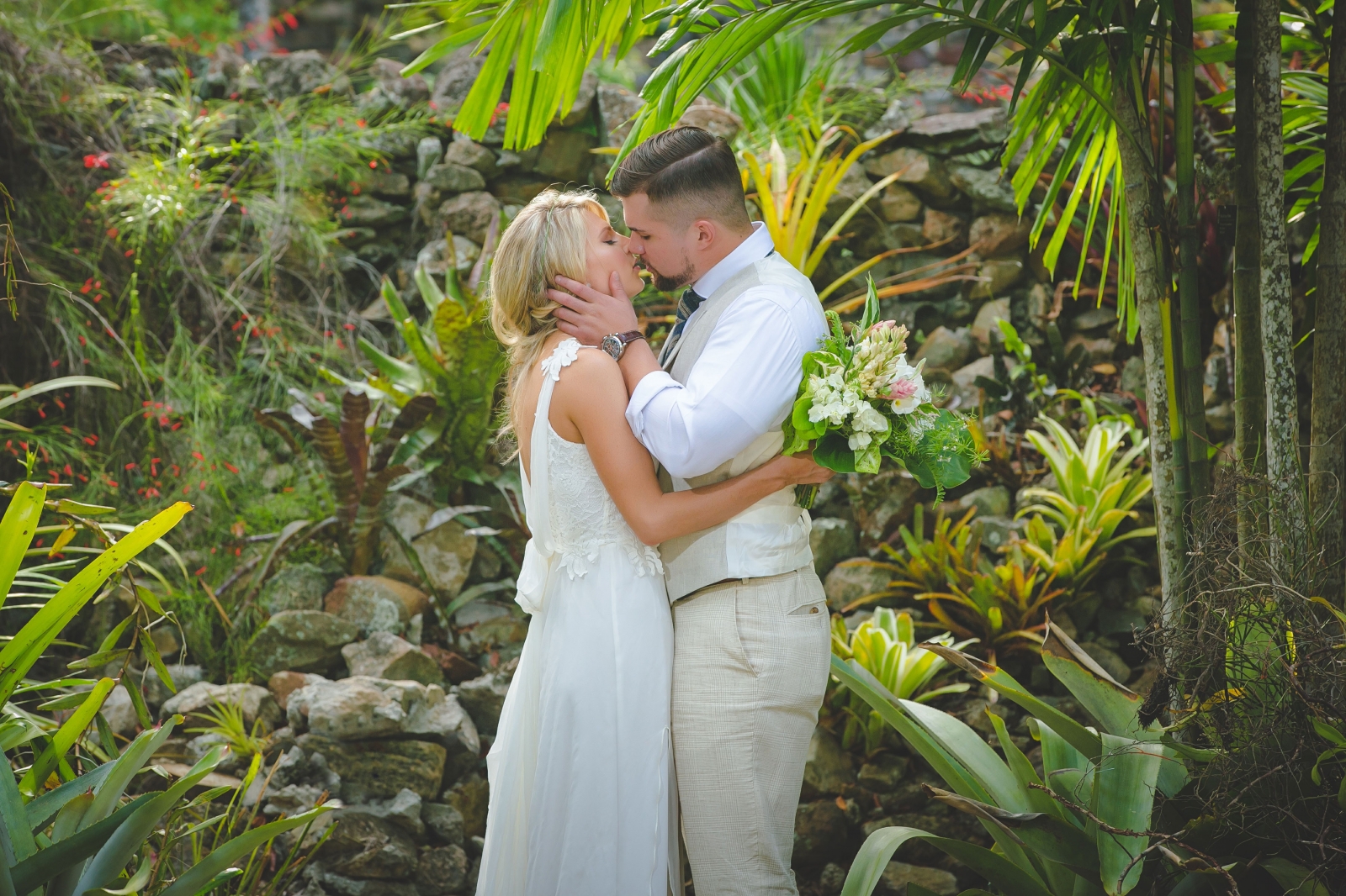 St. Croix wedding couple kissing in botanical garden