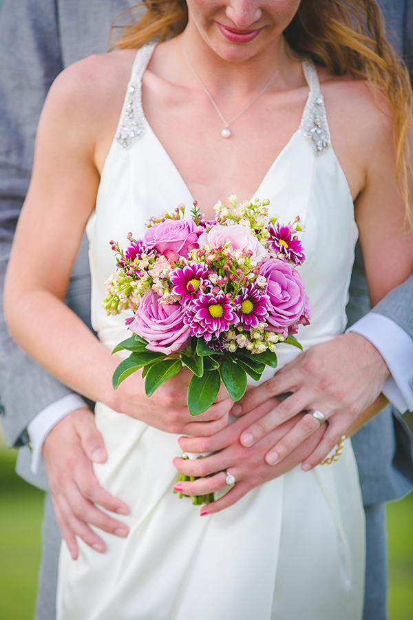 St. Croix bride and groom holding bouquet