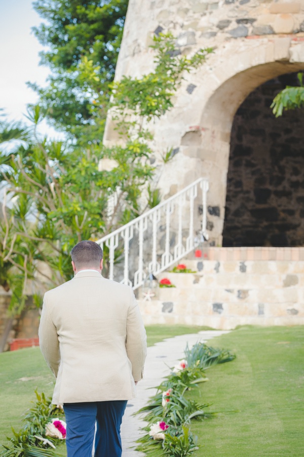 St. Croix groom walking down the aisle to Sugar Mill