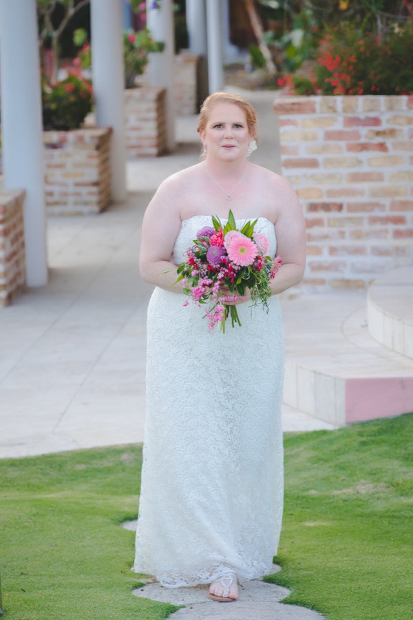 St. Croix bride walking up the aisle to sugar mill