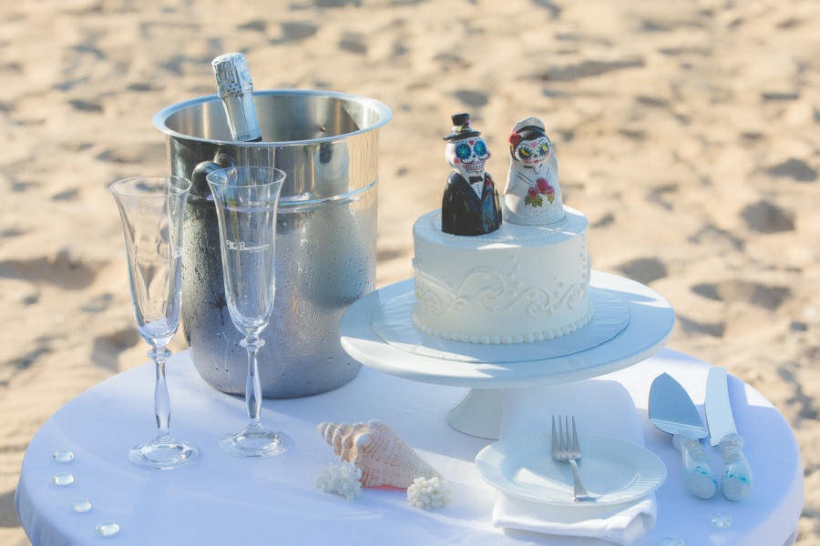 St. Croix bride and groom wedding cake on beach