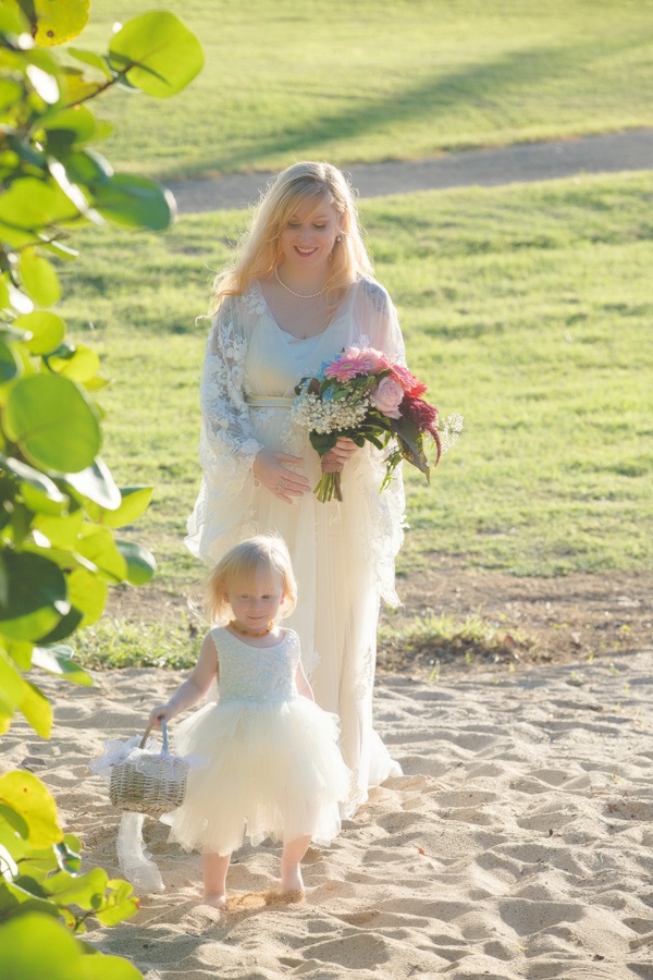 St. Croix bride and child walking down the aisle on beach