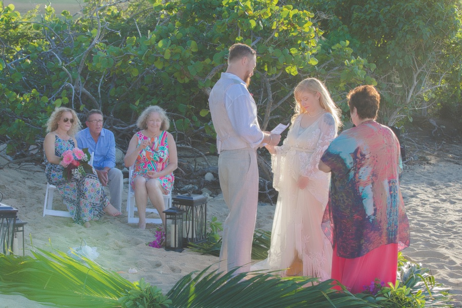 St. Croix bride and groom exchanging wedding vows on beach